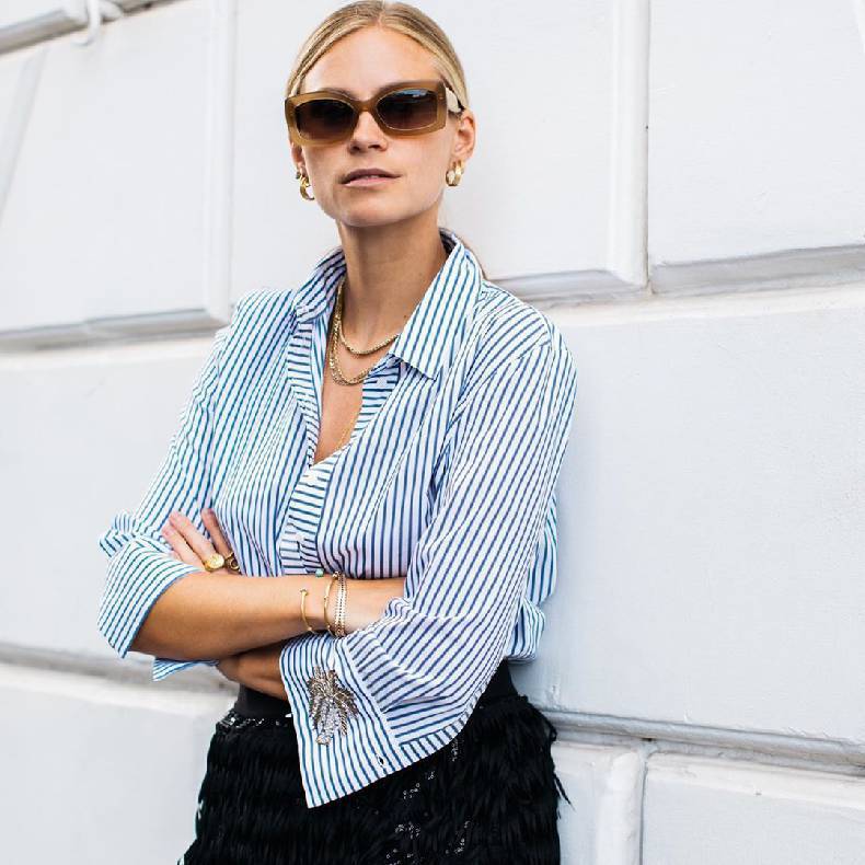 A laconic oxford shirt is considered one of the trends this spring. image-1